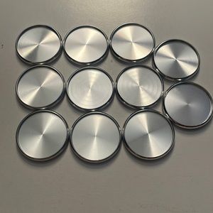 Arc 1.5” silver metal discs.  Set of 11
